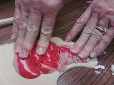 Grandma making Snowman Cookie